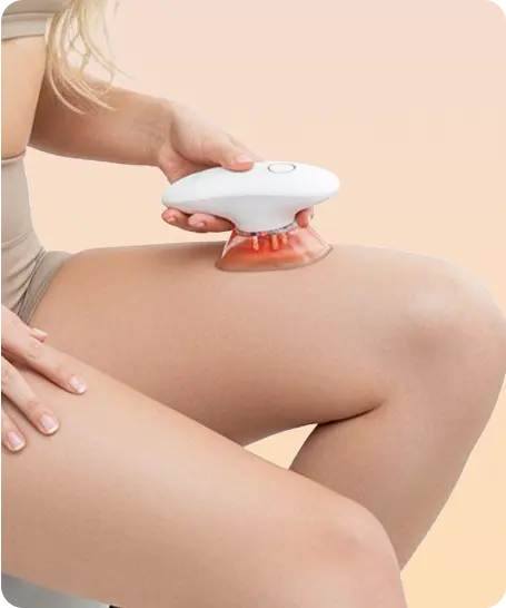 Dispositivo Redu Sculpt aplicado en los muslos para reducir celulitis y estilizar piernas